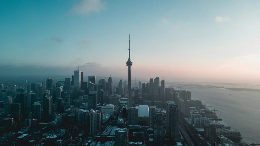 Toronto Skyline (Image Source: Photo by Patrick Tomasso on Unsplash)