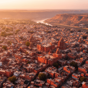 AI-generated image of Karauli City Palace at sunset, showcasing its vibrant red sandstone glowing under the golden hour sky, a majestic blend of Rajput and Mughal architecture.